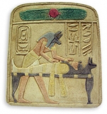 Anubis při mumifikaci